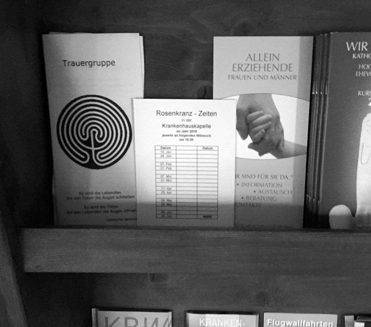 Labyrinth-like icon on a bereavement group brochure at St. Andreas church