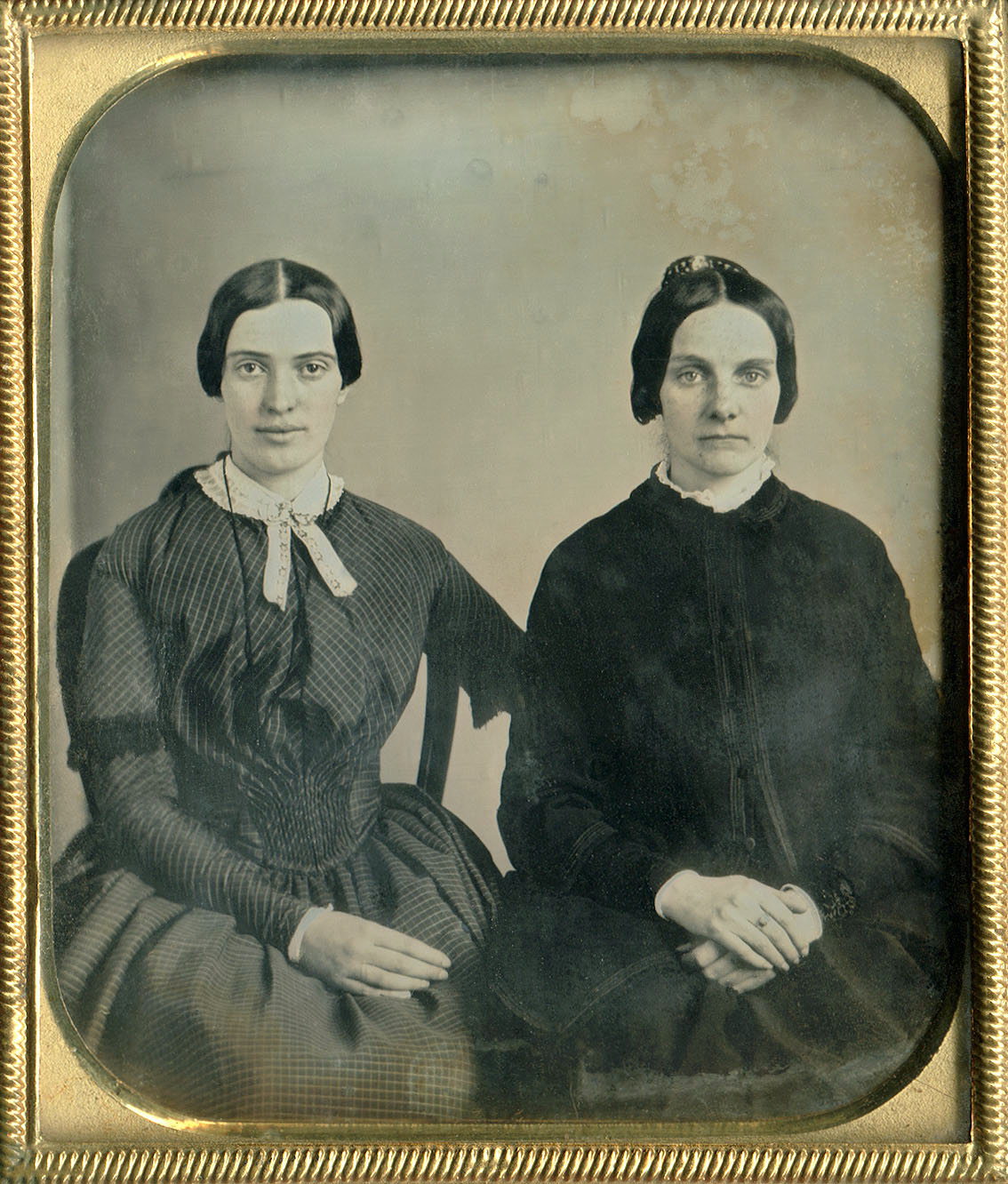 Perhaps a daguerreotype of Emily Dickinson (left) and her friend Kate Scott Turner, c.1859