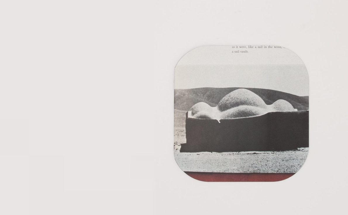 MMDC3, spread: a photograph of a domed building in a desert landscape